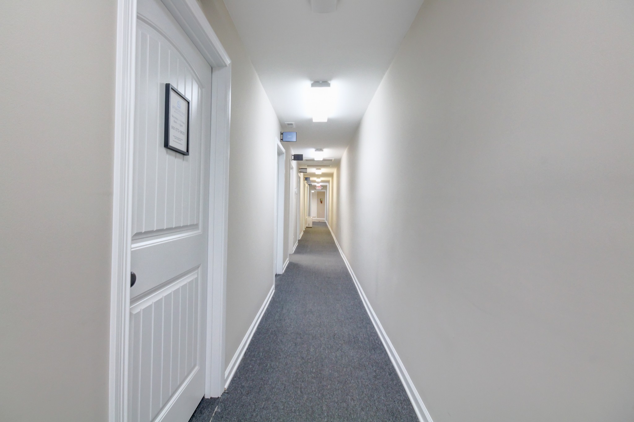 1017 South Riverside Drive Clarksville, TN 37040 - Photo 22 of 51 a view of a hallway with wooden floor