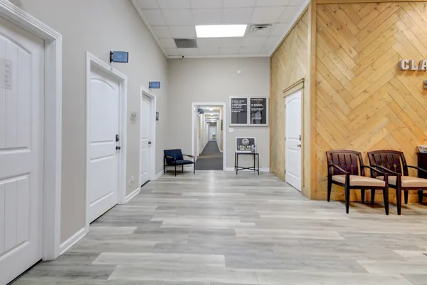 a view of a livingroom with furniture and furniture