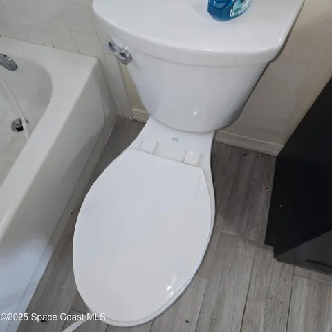 a view of a hallway with washer and dryer