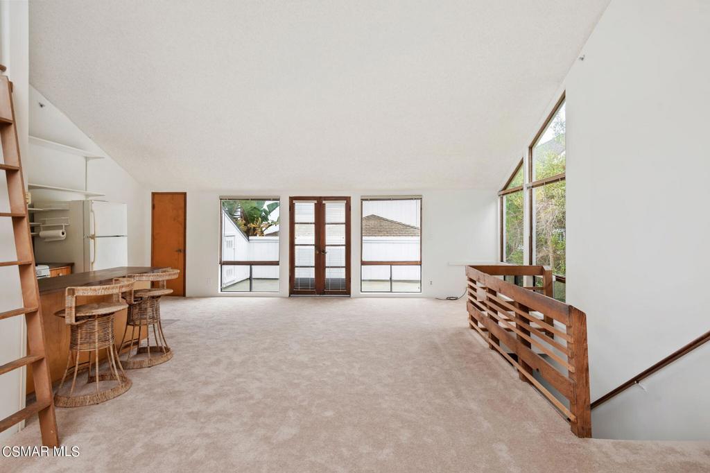 3523 Padaro Lane Carpinteria, CA 93013 - Photo 2 of 14 a living room with furniture and a large window