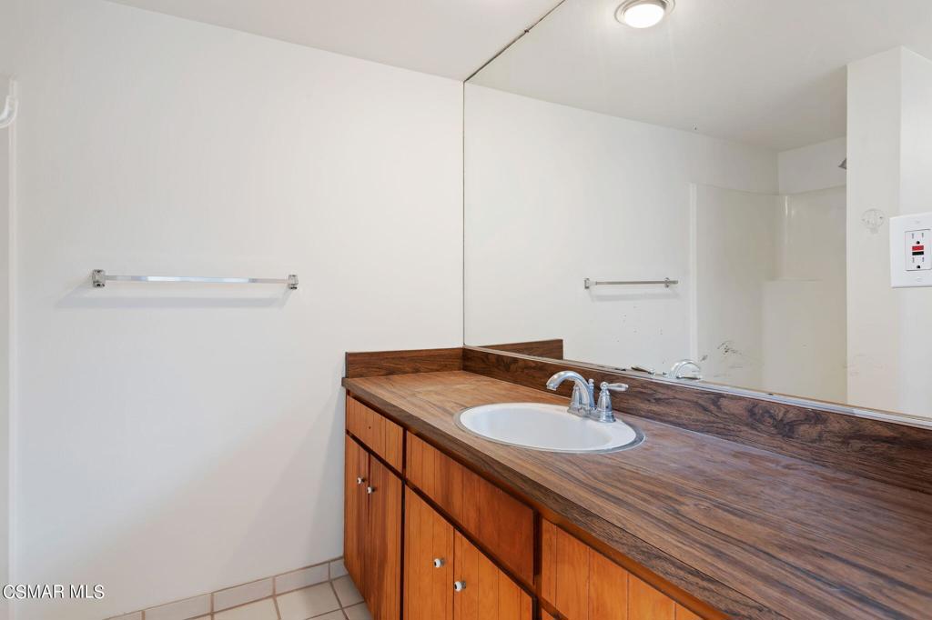 3523 Padaro Lane Carpinteria, CA 93013 - Photo 8 of 14 a bathroom with a sink and a mirror