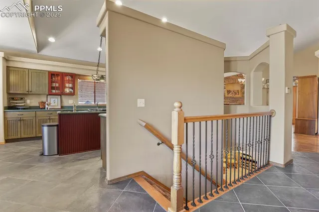 a view of a kitchen from the hallway