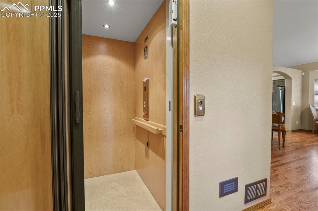 2563 Integrity Court Colorado Springs, CO 80918 - Photo 23 of 49 a bathroom with a shower and a glass door