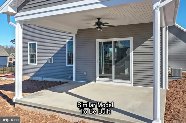 a kitchen with stainless steel appliances granite countertop a granite counter tops and a wooden floor