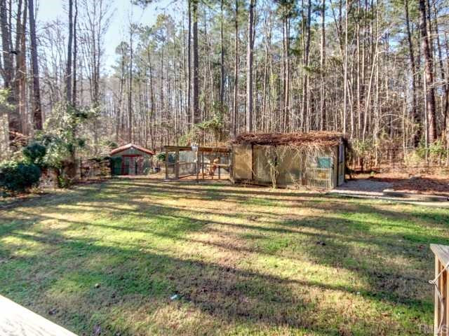 13709 Possum Track Road Raleigh, NC 27614 - Photo 12 of 12 Private back yard! Great area for gardening, greenhouse, chicken coop, storage....ALL OF THIS ON 3.4 acres of land in prime location! This is a rare find in North Raleigh! Back Yard