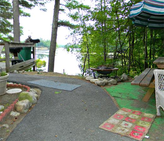 225 Island Road Lunenburg, MA 01462 - Photo 17 of 30 a view of a backyard with sitting area