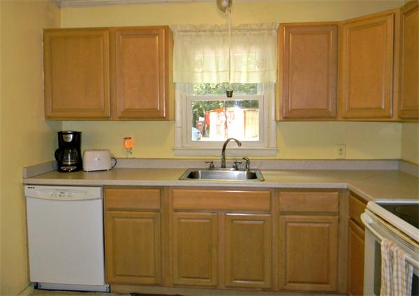 225 Island Road Lunenburg, MA 01462 - Photo 7 of 30 a kitchen with cabinets and window