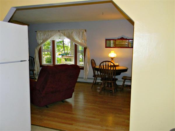 225 Island Road Lunenburg, MA 01462 - Photo 10 of 30 a living room with furniture and a large window