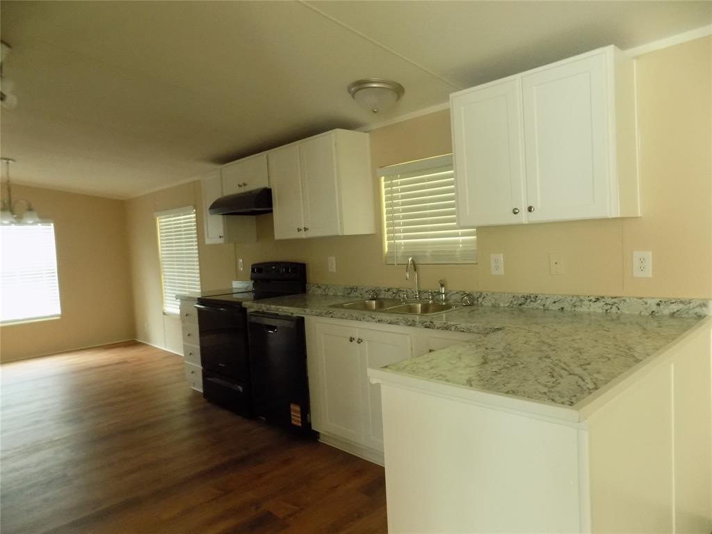 203 South Ridgeview Court Azle, TX 76020 - Photo 3 of 29 Over view of kitchen area with eat-in room.