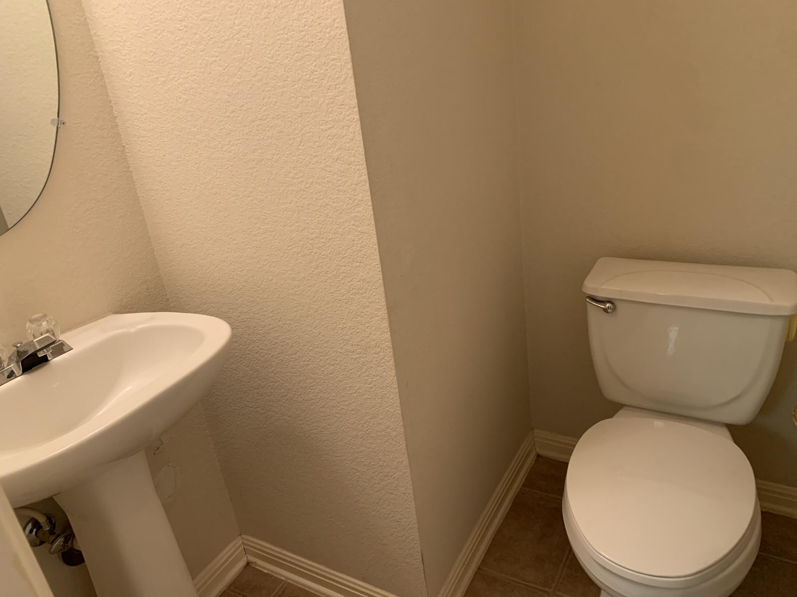 11000 Anderson Mill Road, Unit 29 Austin, TX 78750 - Photo 11 of 27 a bathroom with a toilet and a sink