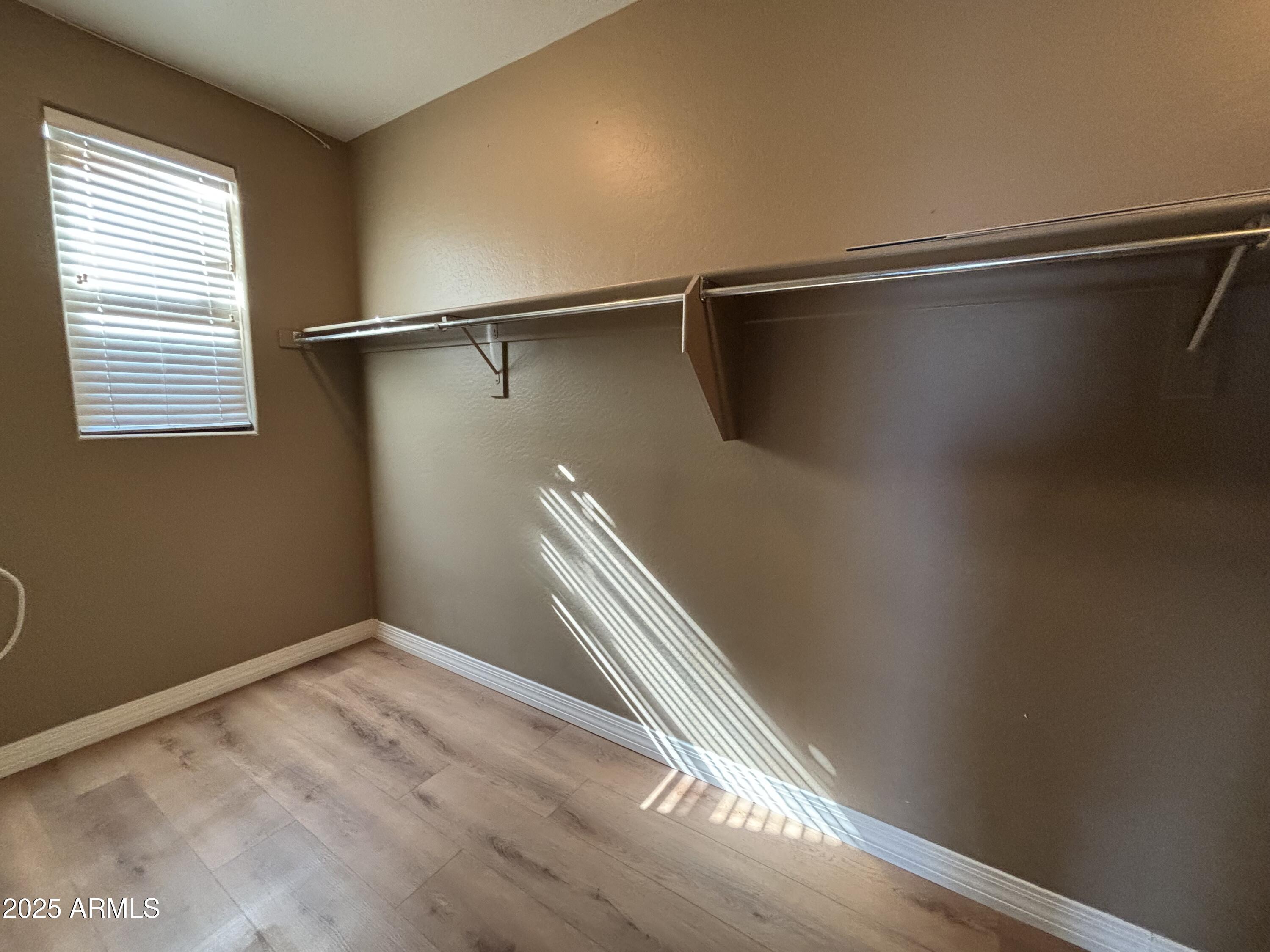615 East Portland Street, Unit 113 Phoenix, AZ 85004 - Photo 16 of 28 a view of a room with wooden floor and staircase