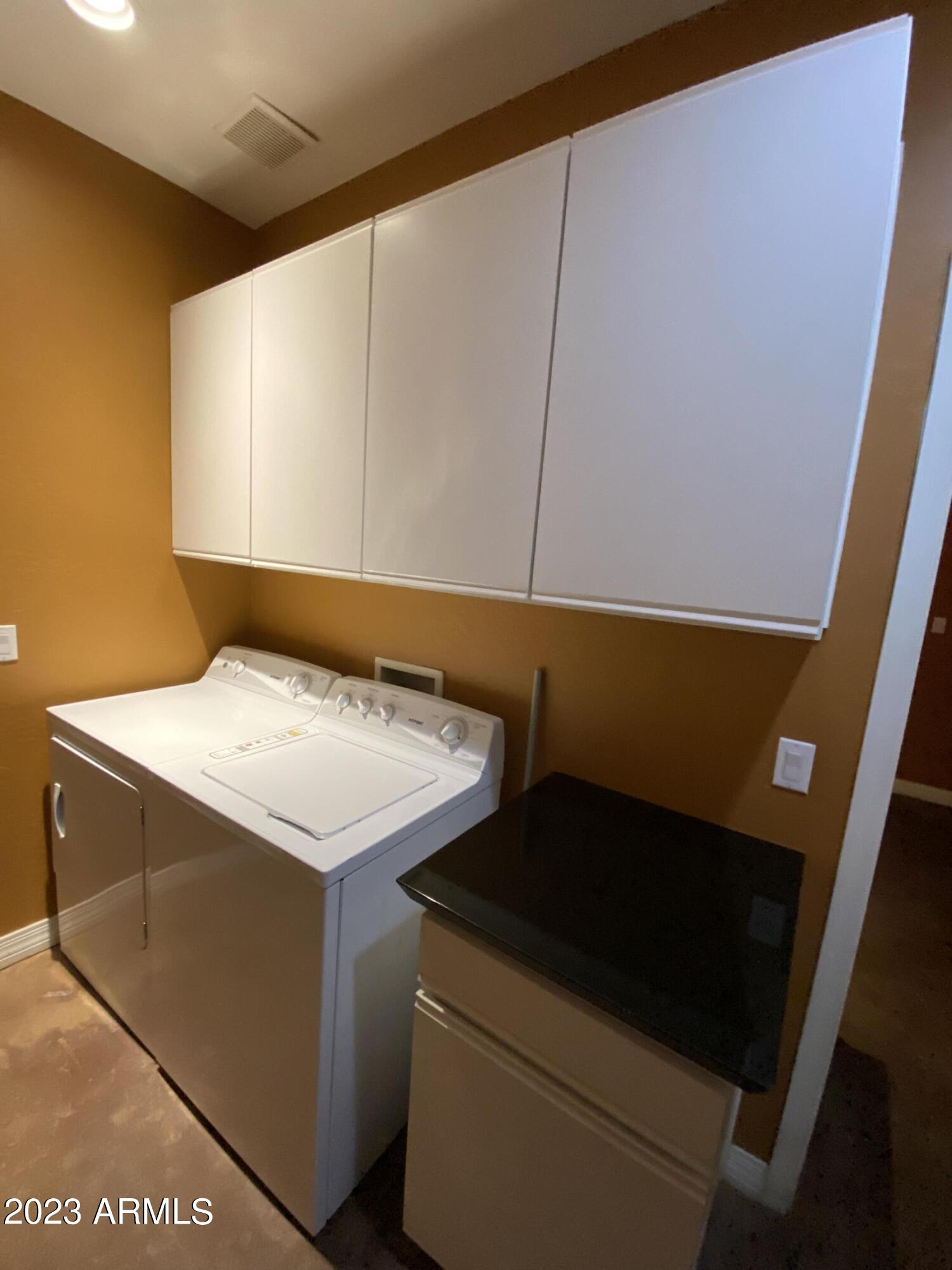 615 East Portland Street, Unit 113 Phoenix, AZ 85004 - Photo 25 of 28 a utility room with dryer and washer