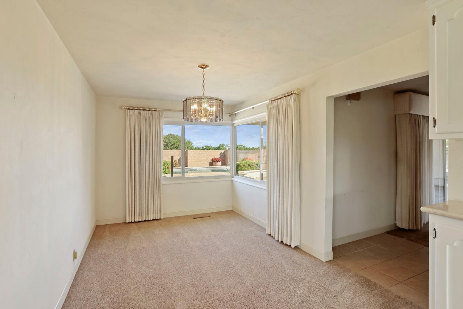 2465 Vernalis Road Tracy, CA 95304 - Photo 9 of 55 a view of kitchen with refrigerator and window