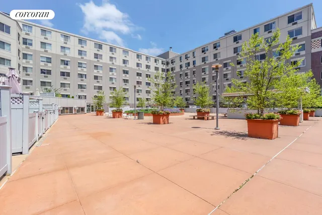a view of a car parked in front of a building