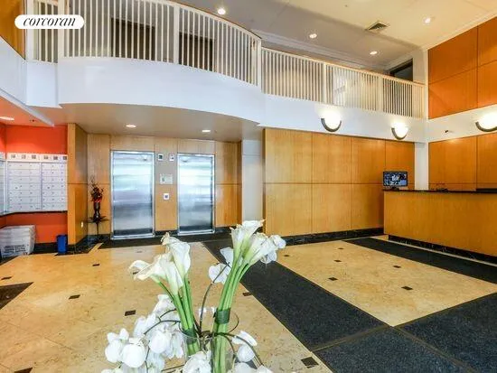 a room with gym equipment and large mirror