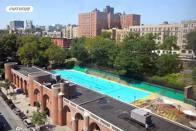 a view of backyard with a table and chairs and potted plants