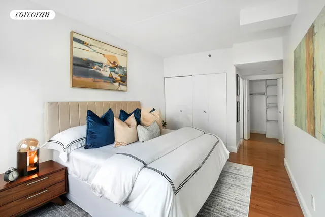 a kitchen with stainless steel appliances granite countertop a refrigerator and a stove