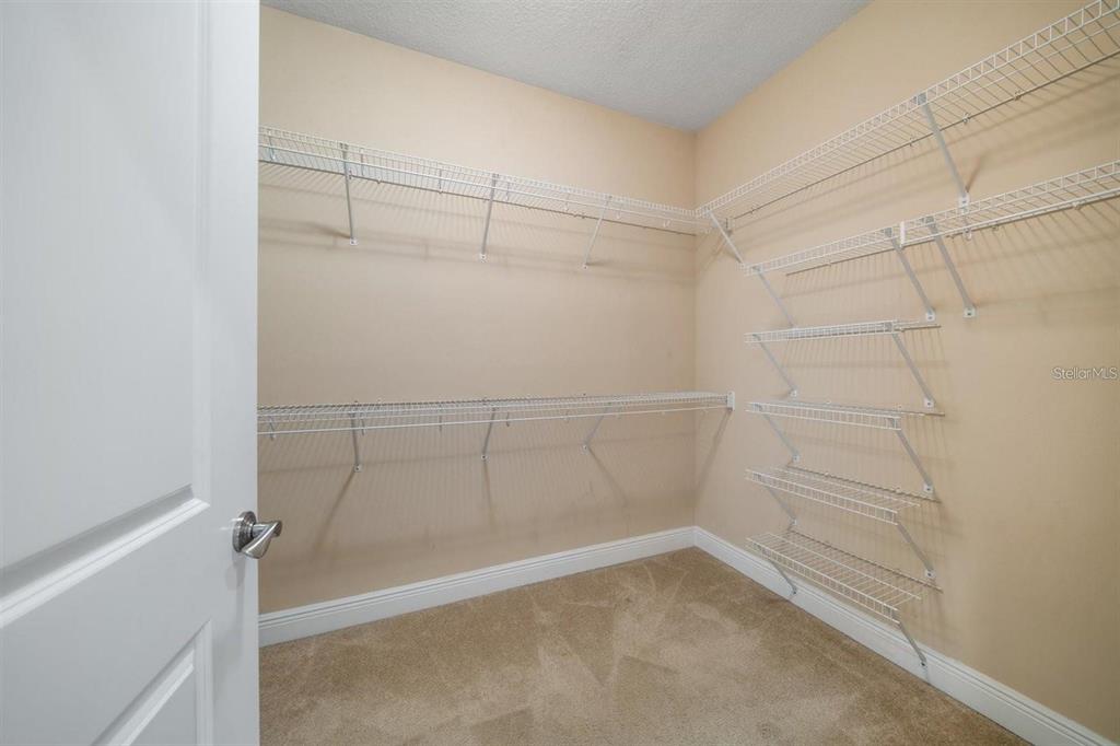 1030 Bellasol Way, Unit 201 Apollo Beach, FL 33572 - Photo 16 of 36 a view of a room with empty racks