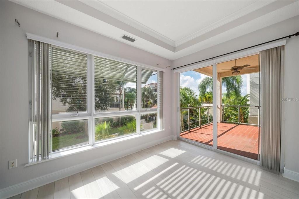 1030 Bellasol Way, Unit 201 Apollo Beach, FL 33572 - Photo 17 of 36 a view of a room with a large window