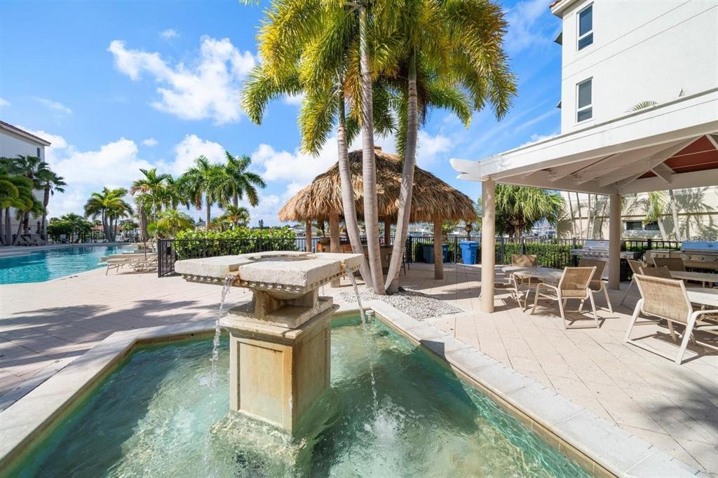 1030 Bellasol Way, Unit 201 Apollo Beach, FL 33572 - Photo 28 of 36 a view of a patio with swimming pool