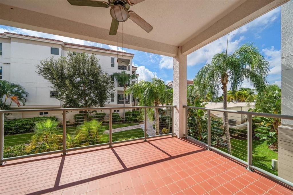 1030 Bellasol Way, Unit 201 Apollo Beach, FL 33572 - Photo 8 of 36 a view of a backyard