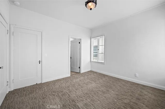 a view of a livingroom with wooden floor