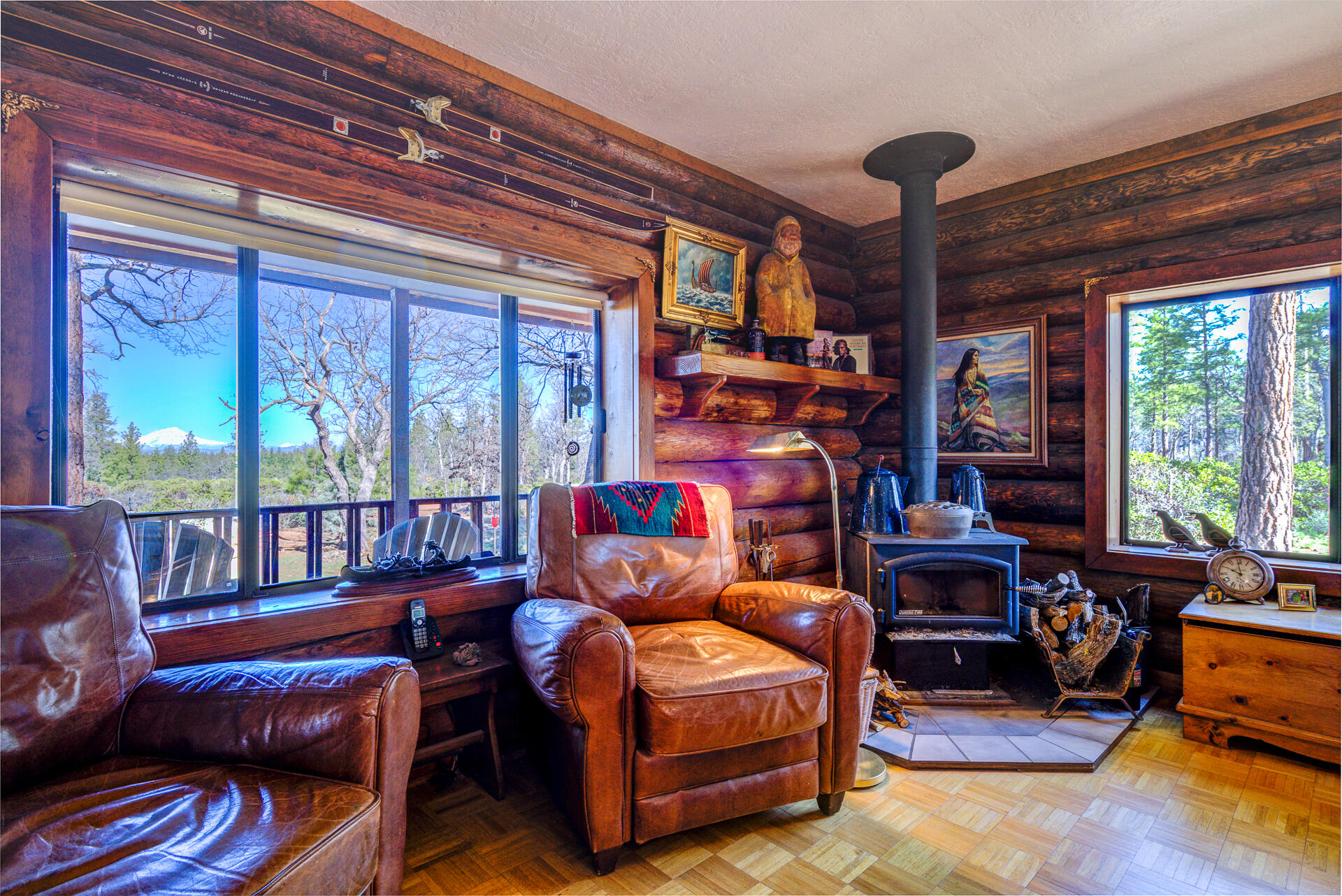 547-705 Old Hwy Road McArthur, CA 96056 - Photo 13 of 62 a living room with furniture a flat screen tv and large windows