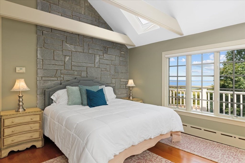 500 Shore Road Chatham, MA 02633 - Photo 19 of 32 a bedroom with a bed and a large window