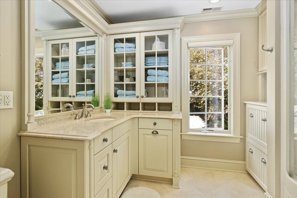 500 Shore Road Chatham, MA 02633 - Photo 20 of 32 a bathroom with a granite countertop sink and a window