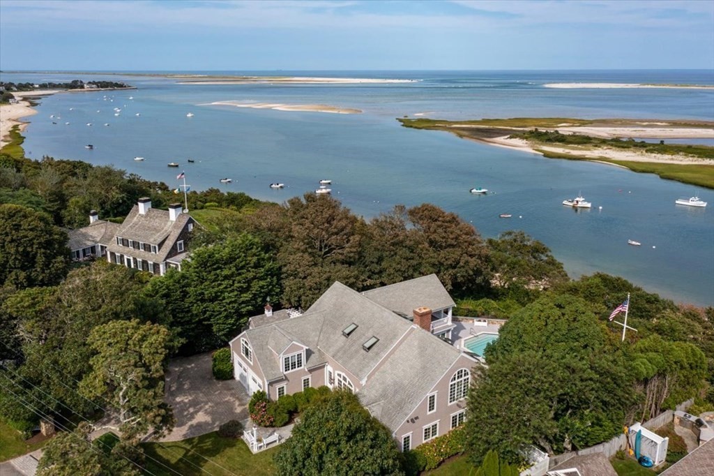 500 Shore Road Chatham, MA 02633 - Photo 23 of 32 an aerial view of a house with a lake view