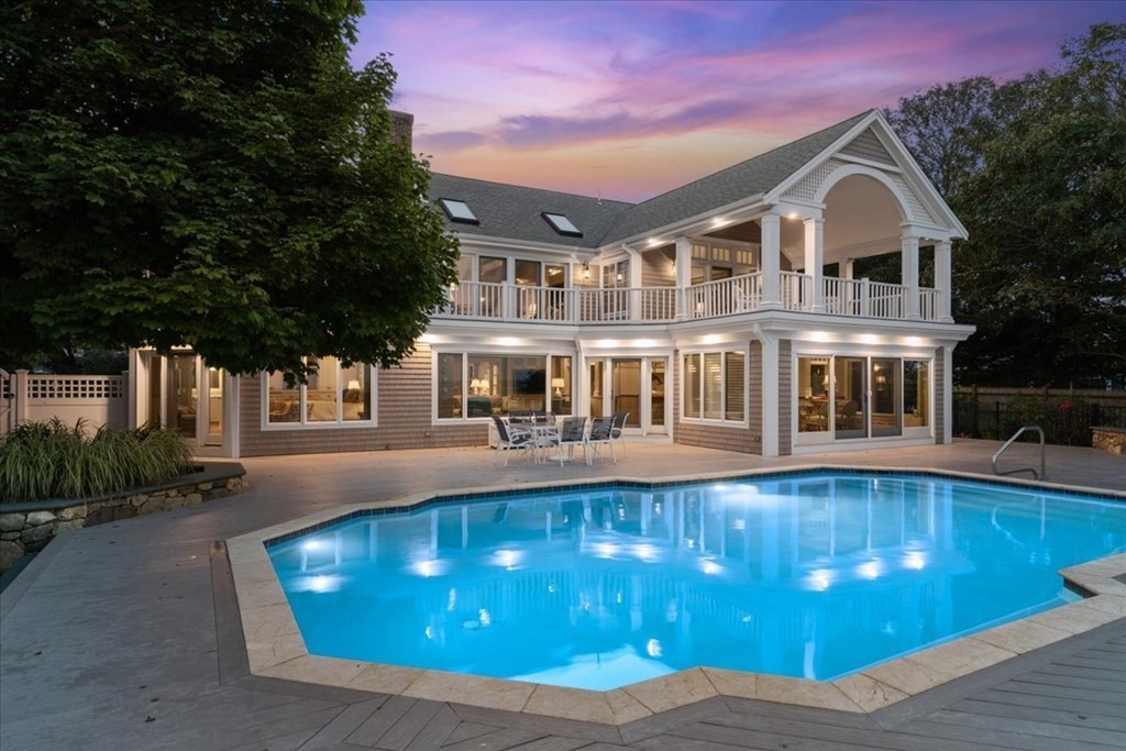 500 Shore Road Chatham, MA 02633 - Photo 32 of 32 a front view of a house with a yard