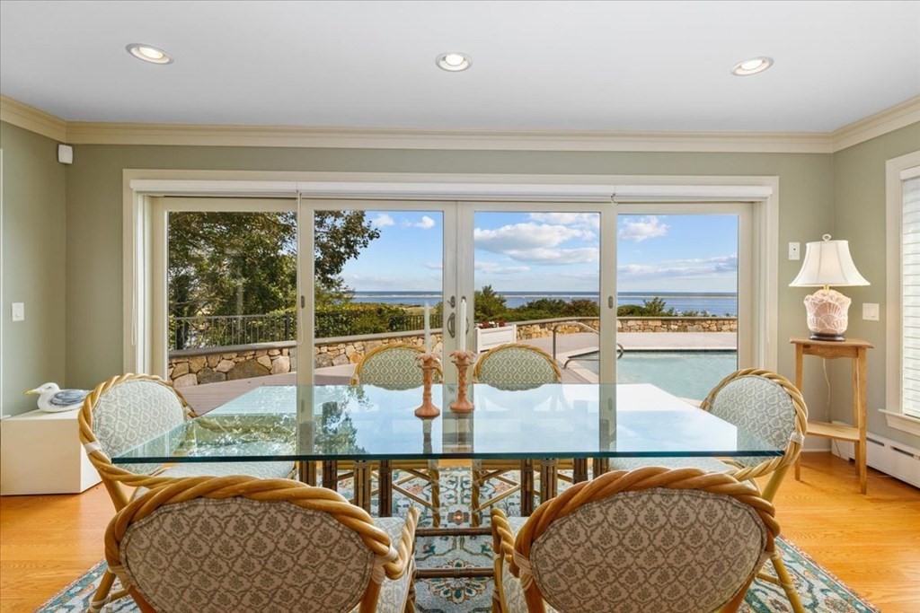 500 Shore Road Chatham, MA 02633 - Photo 9 of 32 a view of a dining room with furniture window and outside view