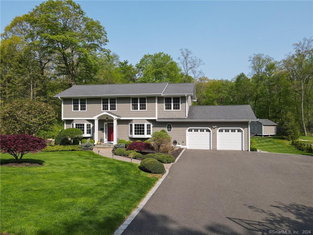 front view of a house with a yard