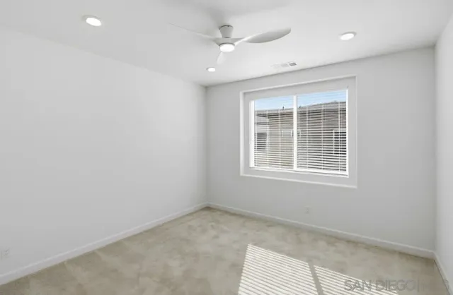 a bathroom with a sink a mirror and a shower