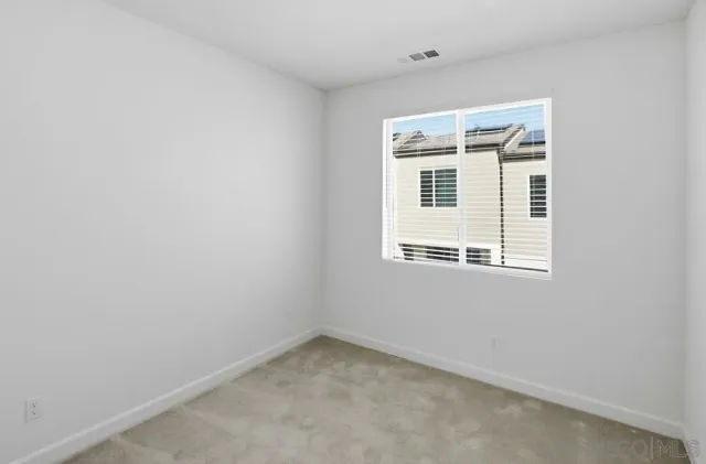 a bathroom with a granite countertop toilet a sink and bathtub