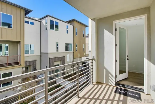 a view of a brick building with many windows