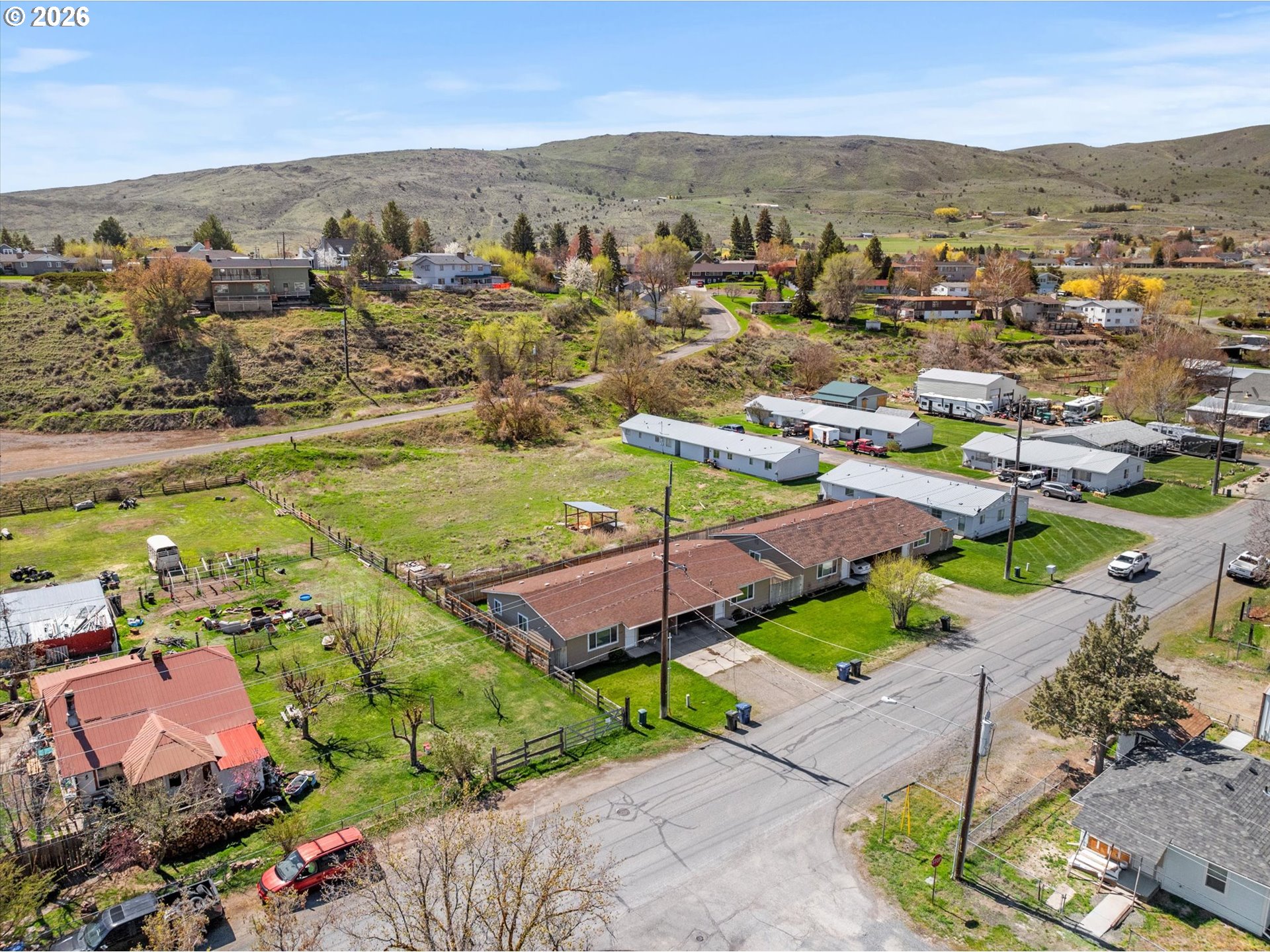 2735-2745 Myrtle Street Baker City, OR 97814 - Photo 14 of 27 an aerial view of residential houses with outdoor space