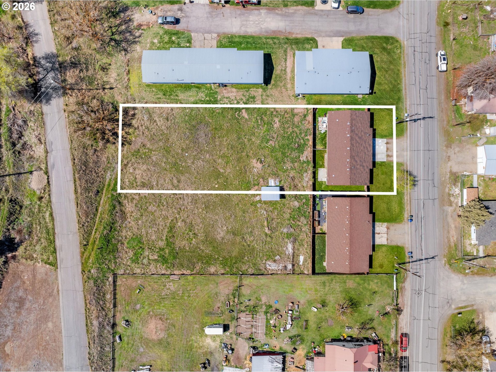2735-2745 Myrtle Street Baker City, OR 97814 - Photo 15 of 27 an aerial view of residential houses with outdoor space