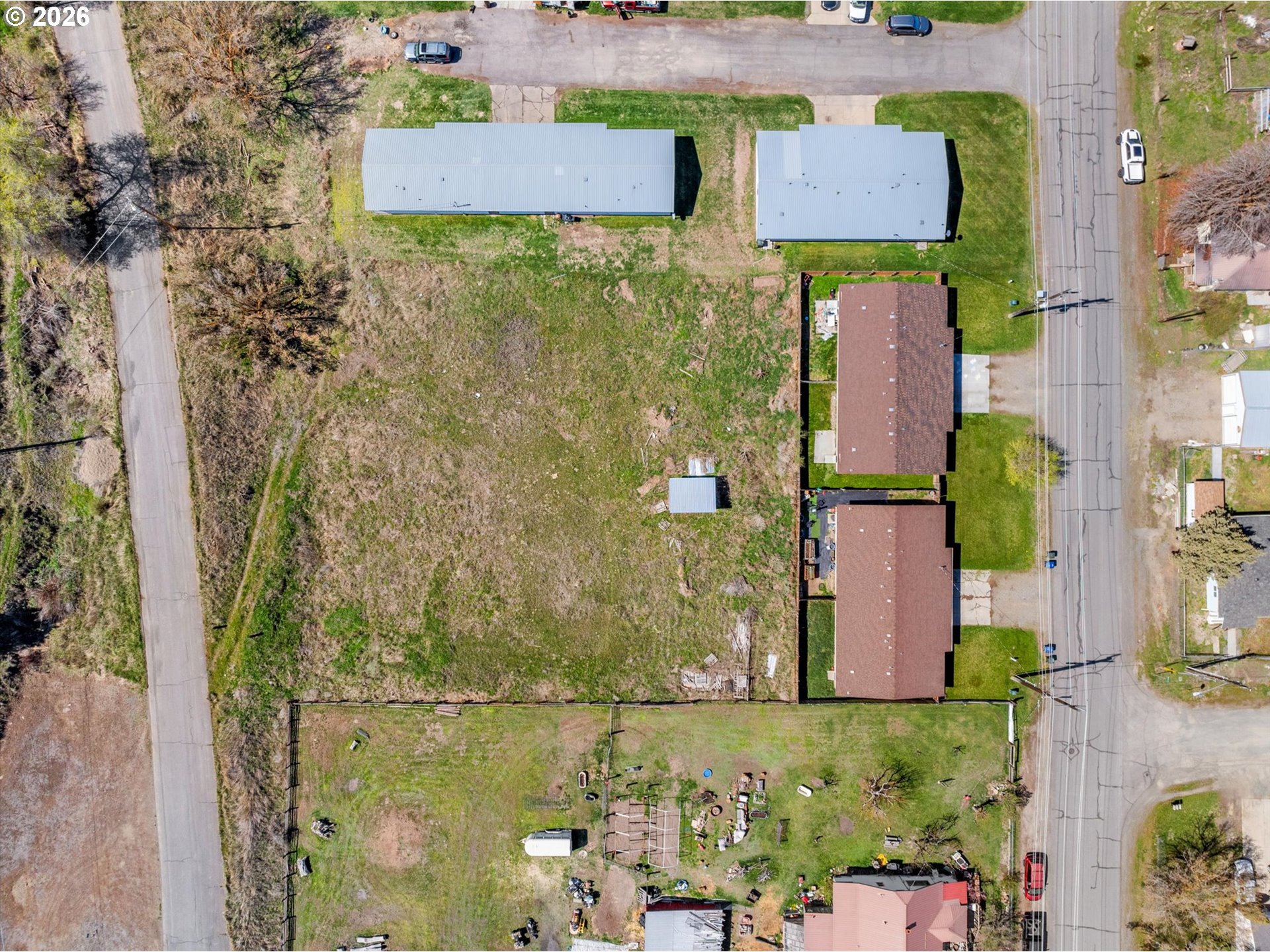 2735-2745 Myrtle Street Baker City, OR 97814 - Photo 16 of 27 aerial view of a house with a yard
