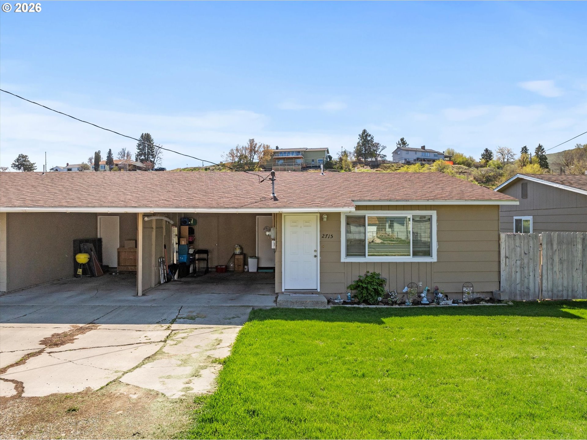2735-2745 Myrtle Street Baker City, OR 97814 - Photo 25 of 27 a front view of a house with garden