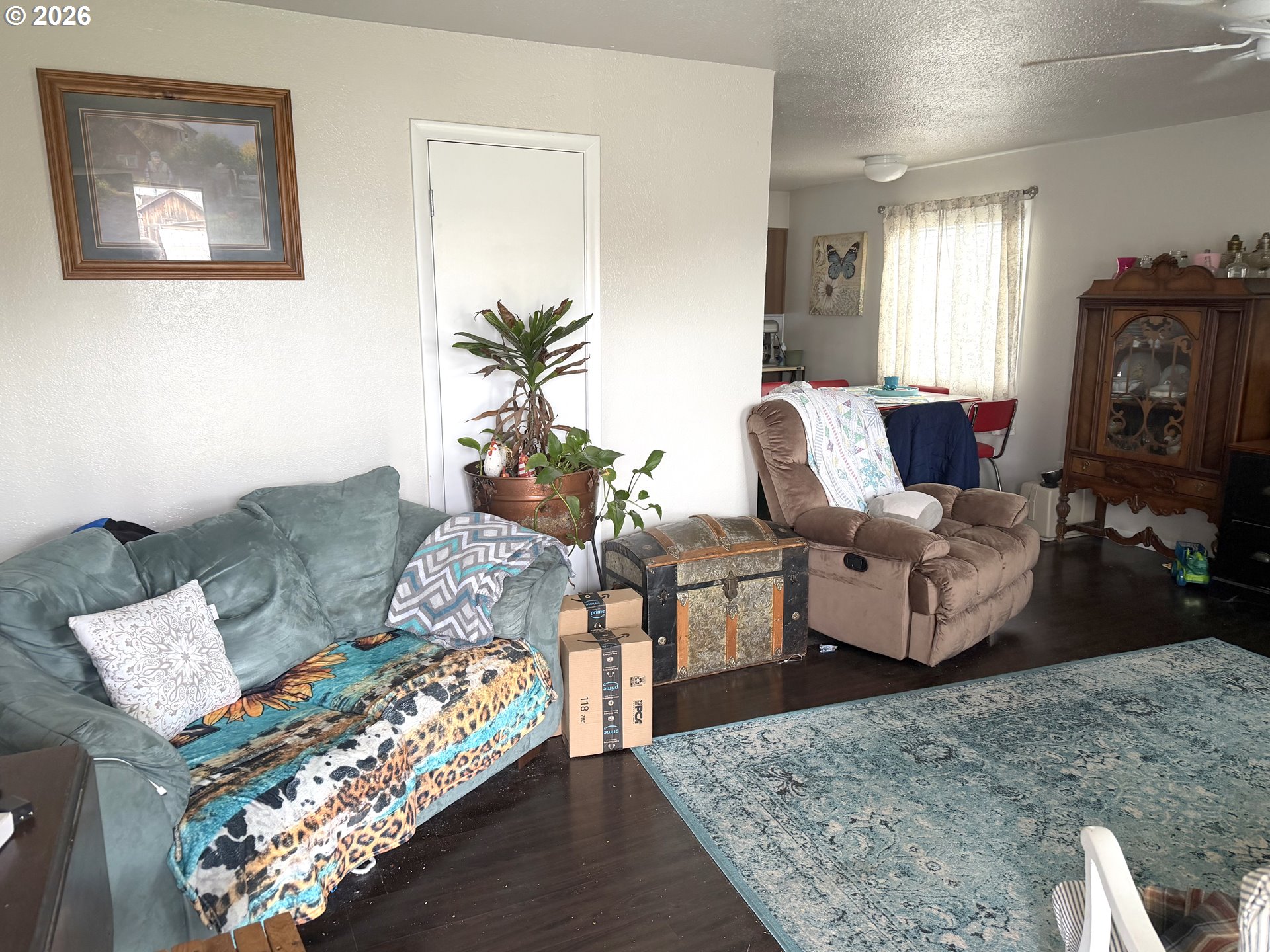 2735-2745 Myrtle Street Baker City, OR 97814 - Photo 3 of 27 a living room with furniture and a fireplace