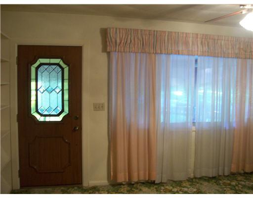233 Reiber Road Renfrew, PA 16053 - Photo 7 of 18 Living Room. Plaster walls, builtin bookcase