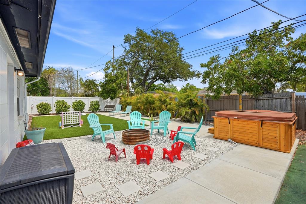 4939 100th Way North St. Petersburg, FL 33708 - Photo 3 of 43 a view of a backyard with sitting area