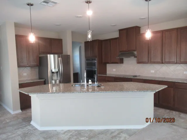 a view of a room that has a window in it