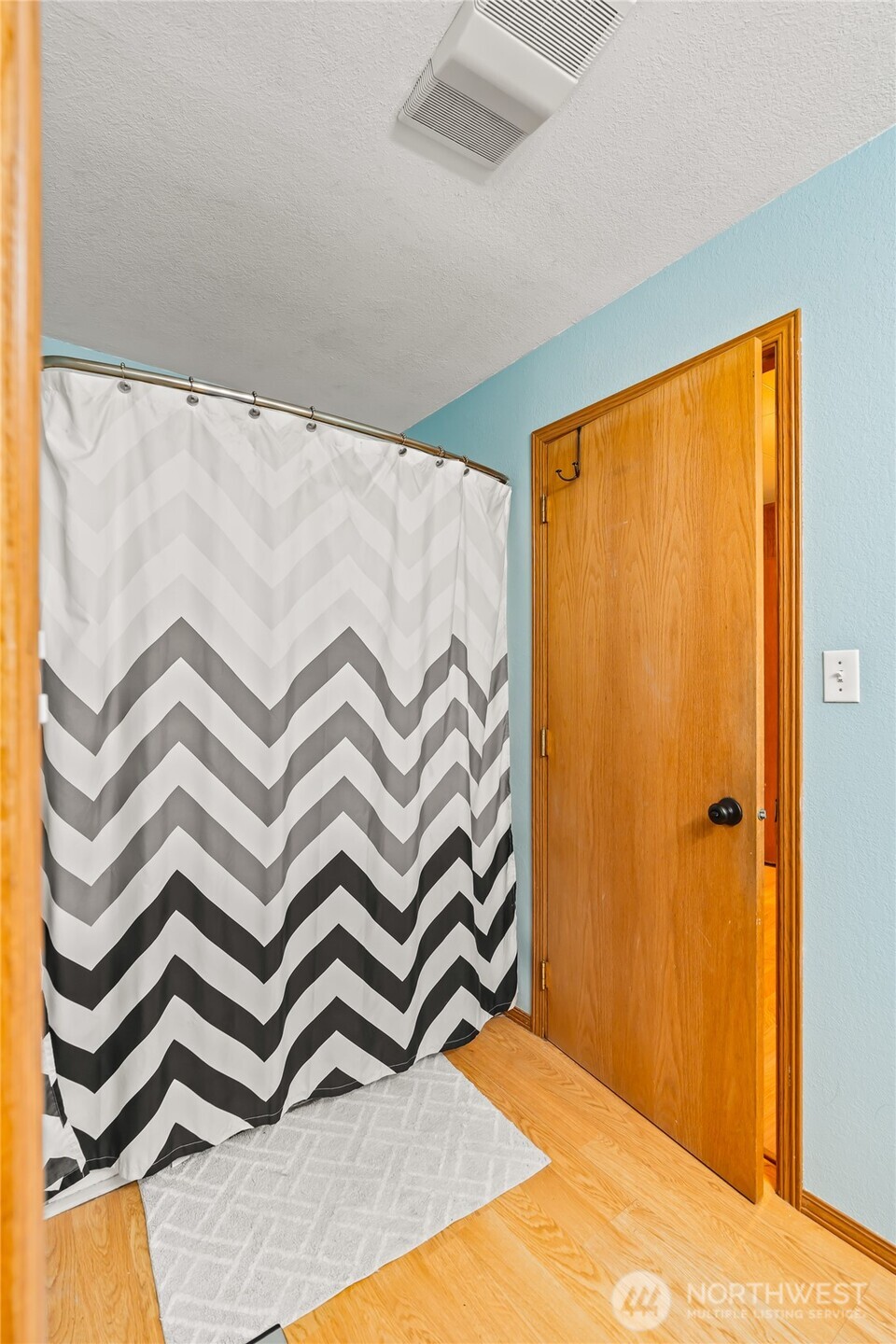 750 Potter Road Tieton, WA 98947 - Photo 15 of 36 a bedroom with a door and a shower