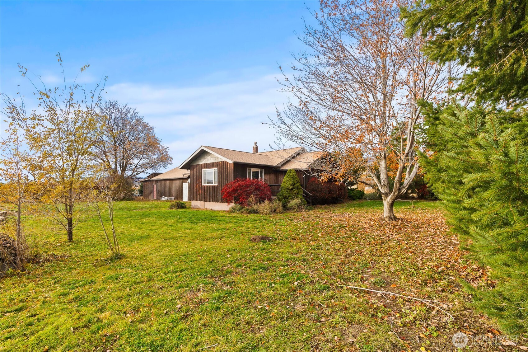 750 Potter Road Tieton, WA 98947 - Photo 24 of 36 a view of a house with a yard