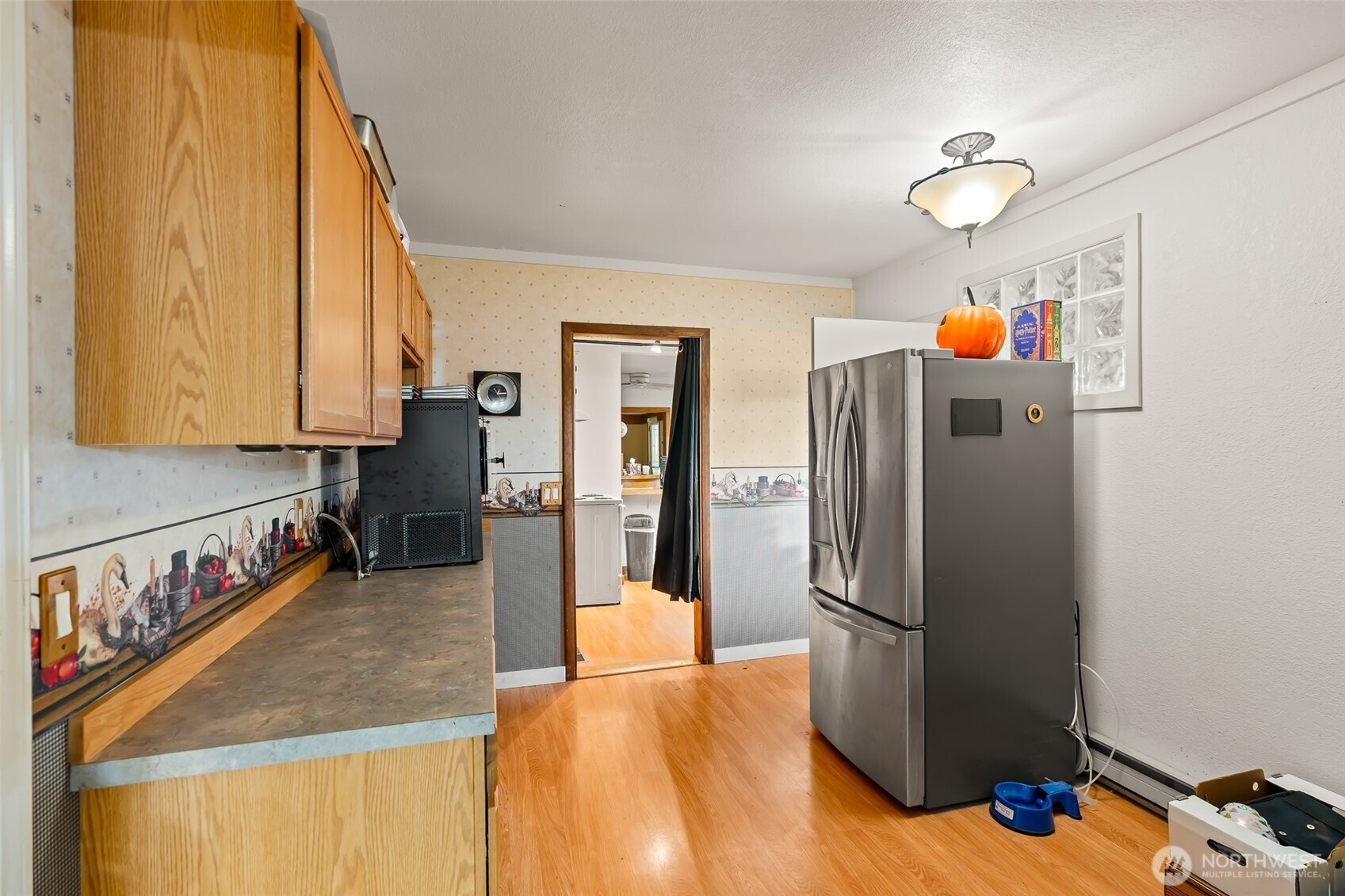 750 Potter Road Tieton, WA 98947 - Photo 8 of 36 a kitchen with stainless steel appliances granite countertop a refrigerator and a sink