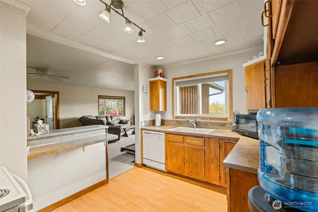 a large kitchen with a large window