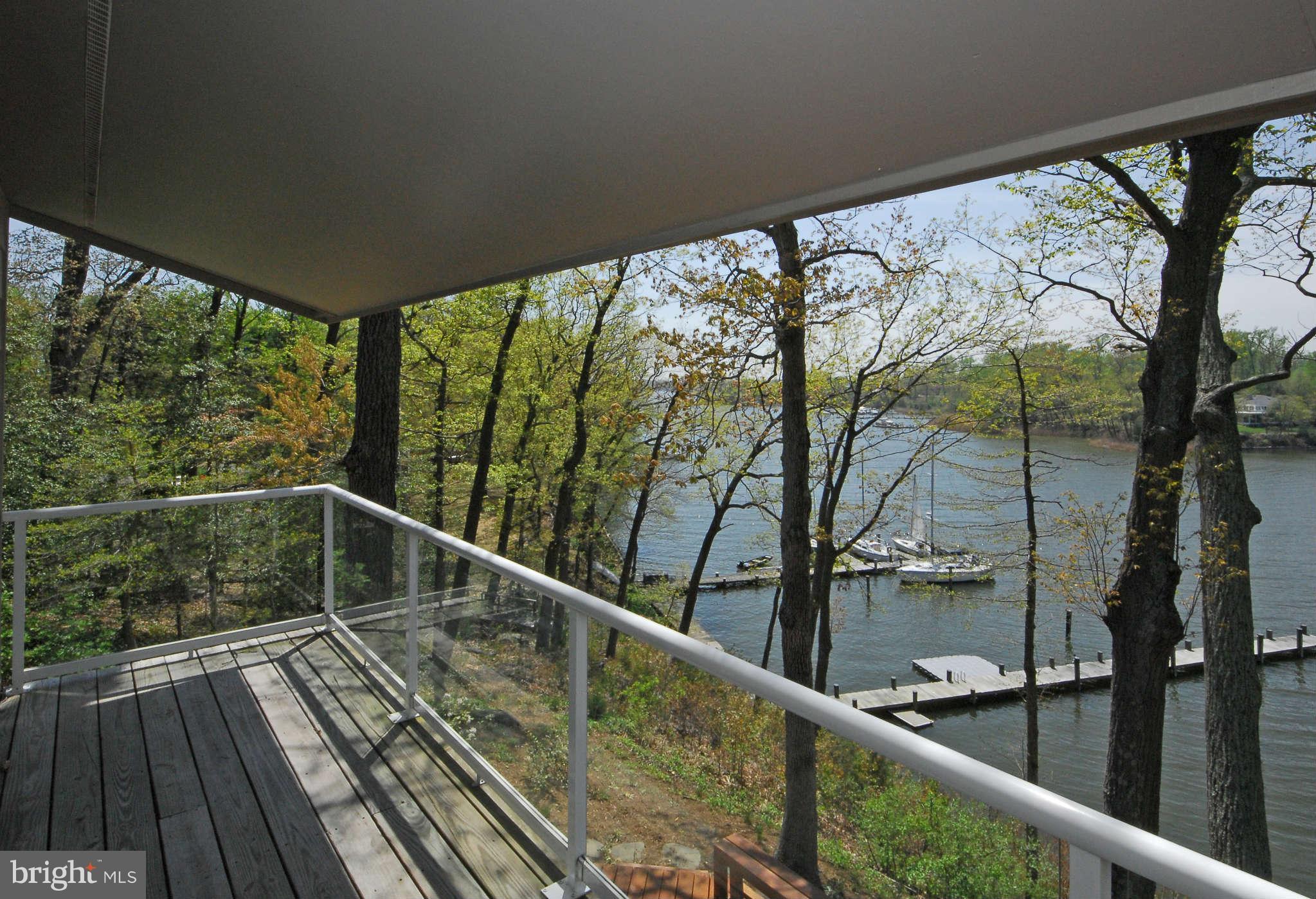 892 Childs Point Road Annapolis, MD 21401 - Photo 22 of 28 Master bedroom private deck