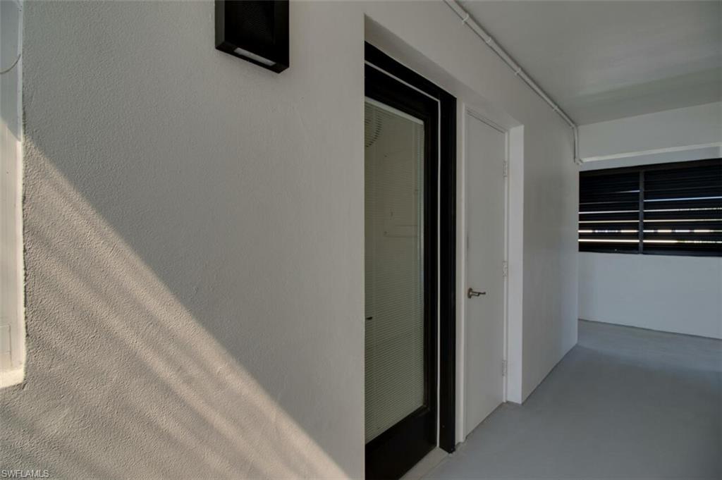 250 7th Avenue South, Unit 305 Naples, FL 34102 - Photo 21 of 24 a view of a kitchen from an empty room